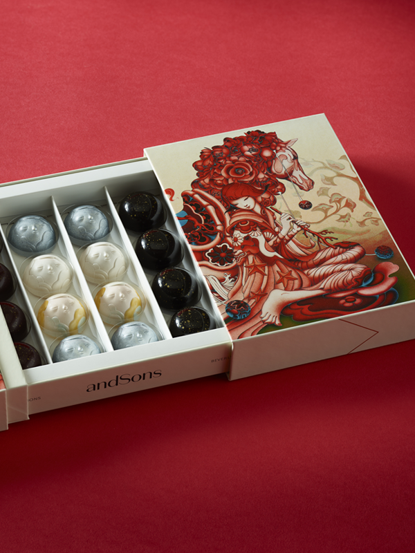 Decorative chocolate box on a red background