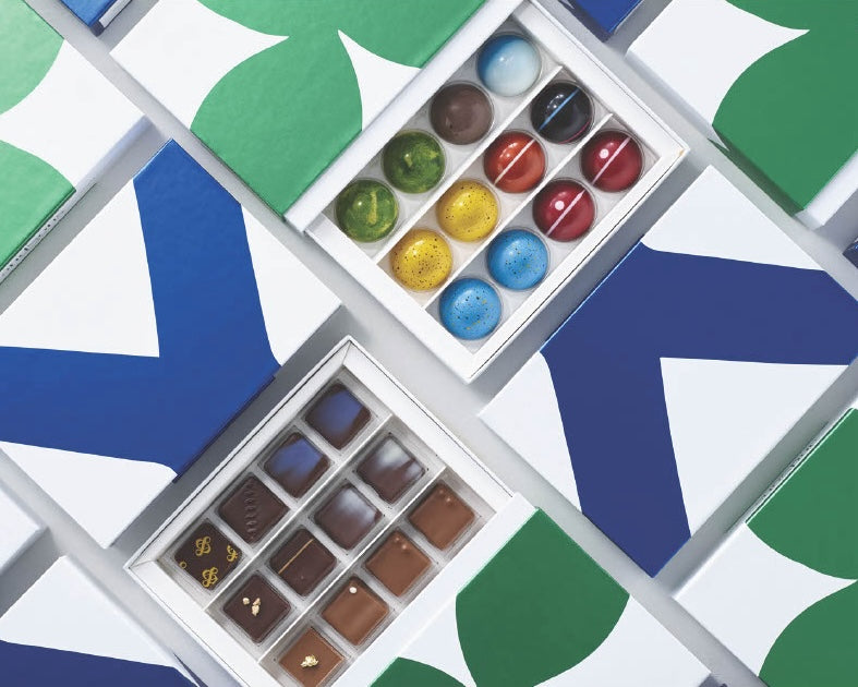 andSons custom boxes of colorful handcrafted chocolates